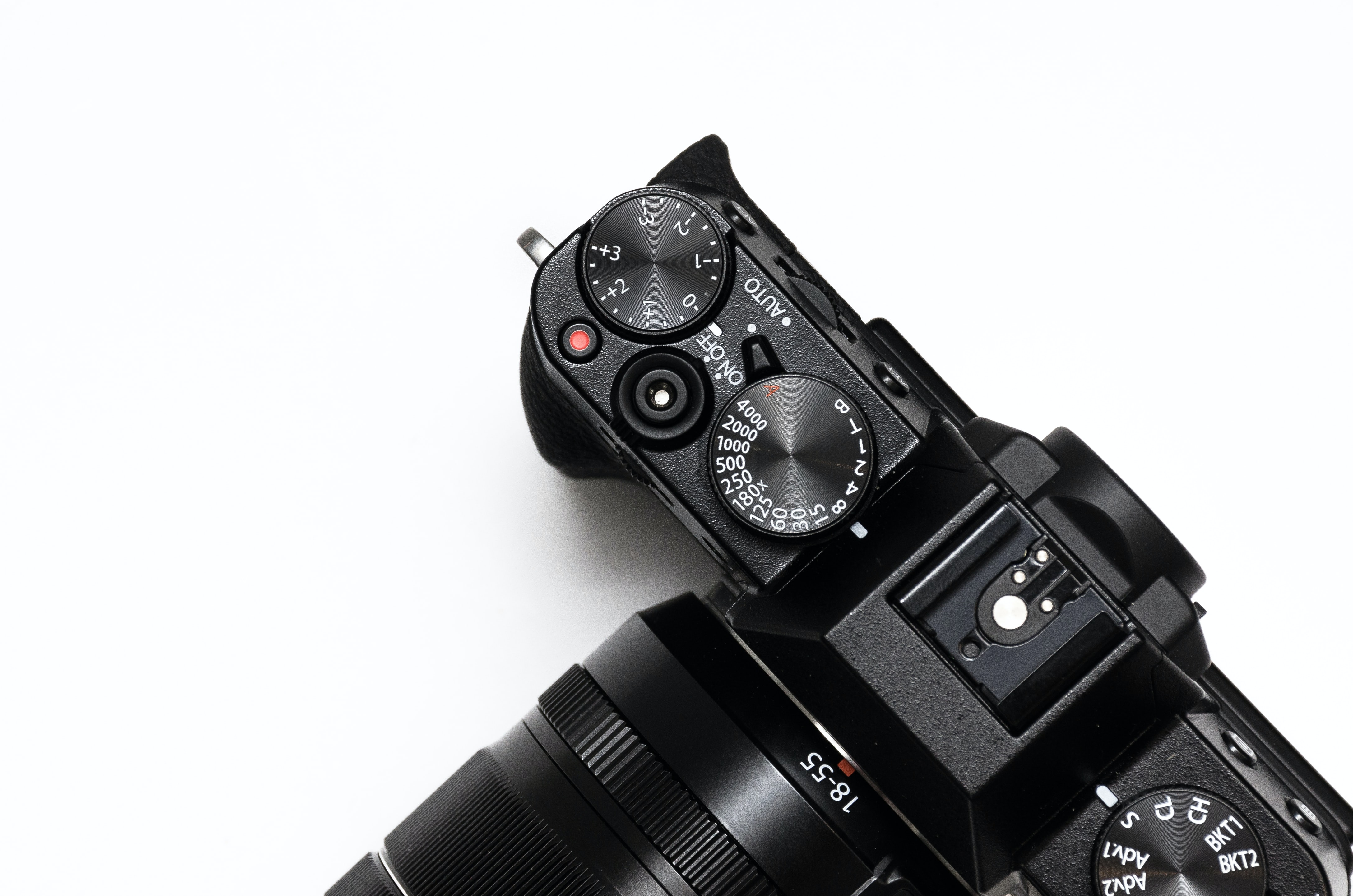 close up, top view of a Fuji mirrorless camera.